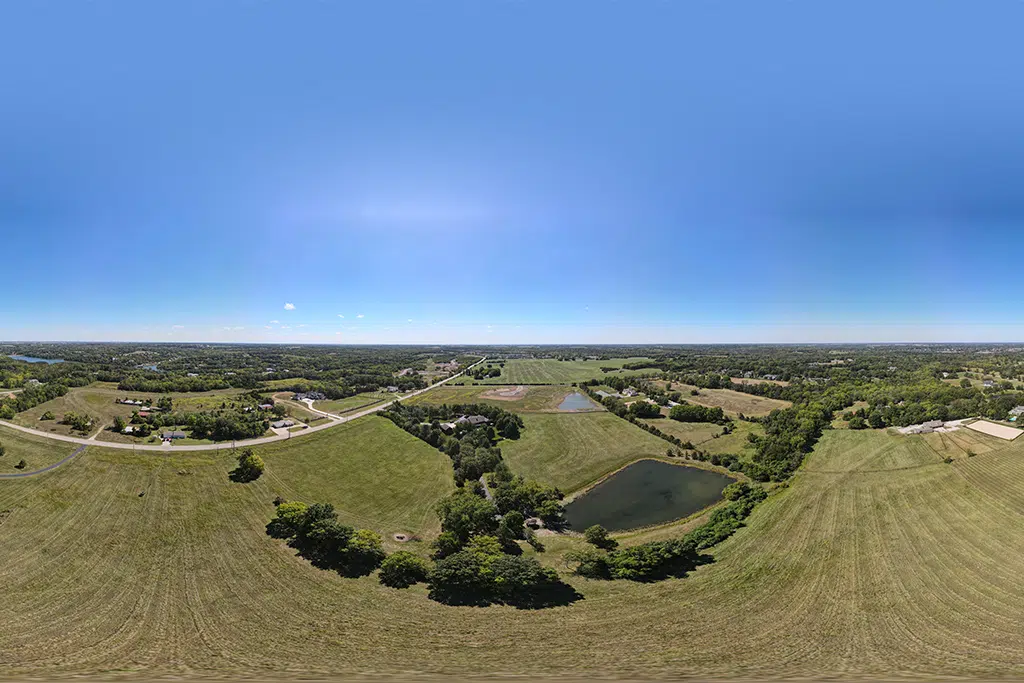Aerial View Of Open Land And Ponds For A Custom Home Building Site