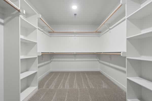 The Milano floor plan as designed by Comerio Homes, showcasing integrated shelving within closet space.