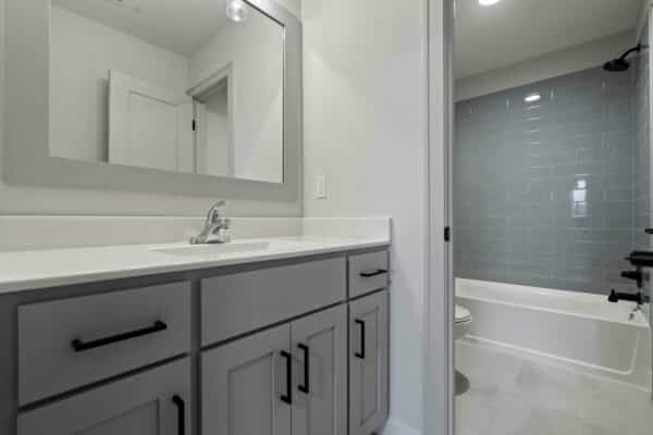 A bathroom view from the Milano floor plan, designed by Comerio Homes in Coventry Valley, Overland Park.