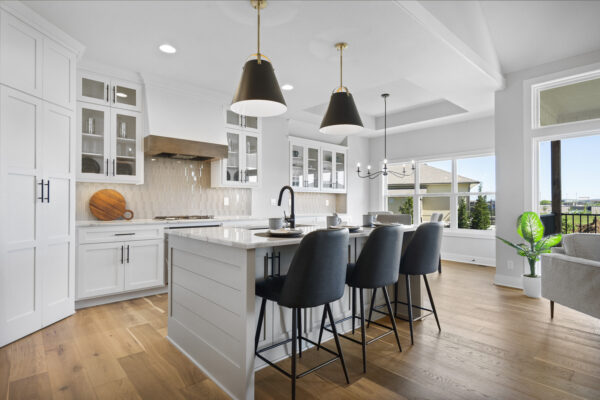 The Siena Story 1.5's modern kitchen with contrasting lightning fixtures.