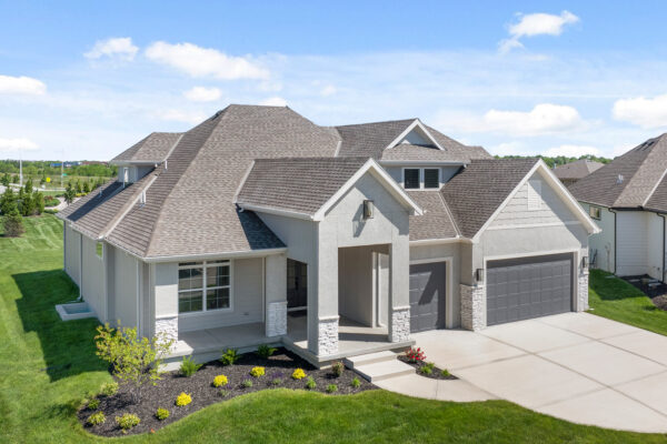 The exterior of the Varese Ex, designed by Comerio Homes, located in Coventry Valley, Overland Park.
