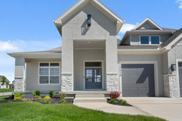The front entrance of the Varese Ex home design in Coventry Valley, Overland Park.