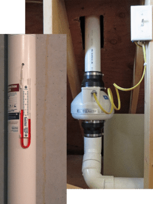 Radon Mitigation System With Radon Level Monitor Installed In A Custom Home