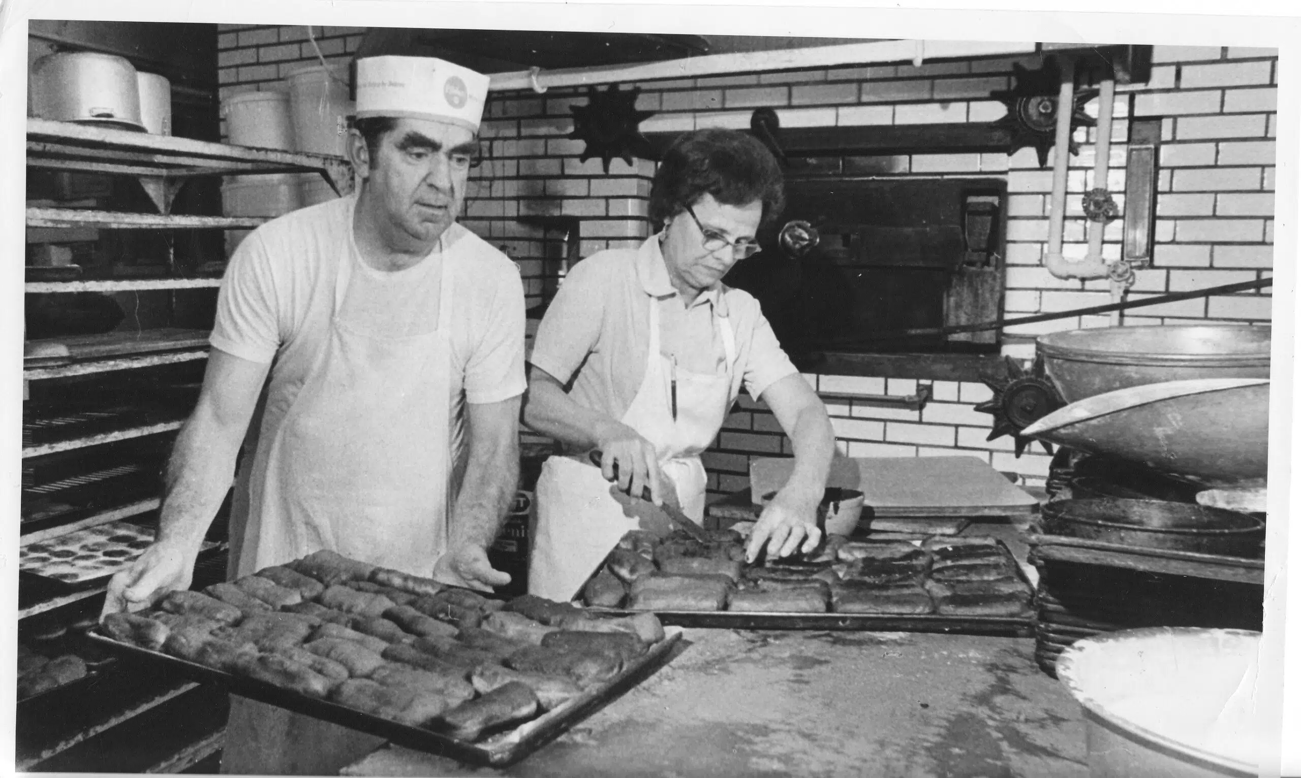 Damon Comerio’s Great-grandparents Working Together At Comerio Bakery On February 23, 1975, Reflecting The Family Heritage Behind Comerio Homes.