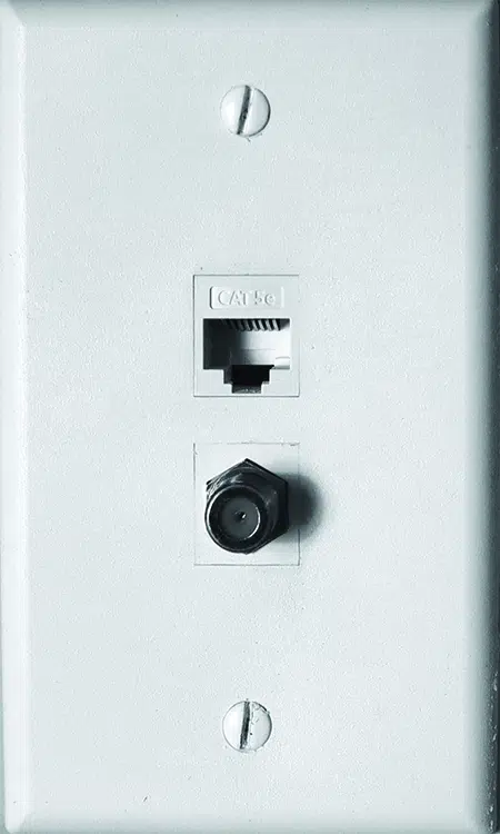Wall Outlet With Cat5e Data And Coaxial TV Connections For Home Networking And Entertainment.