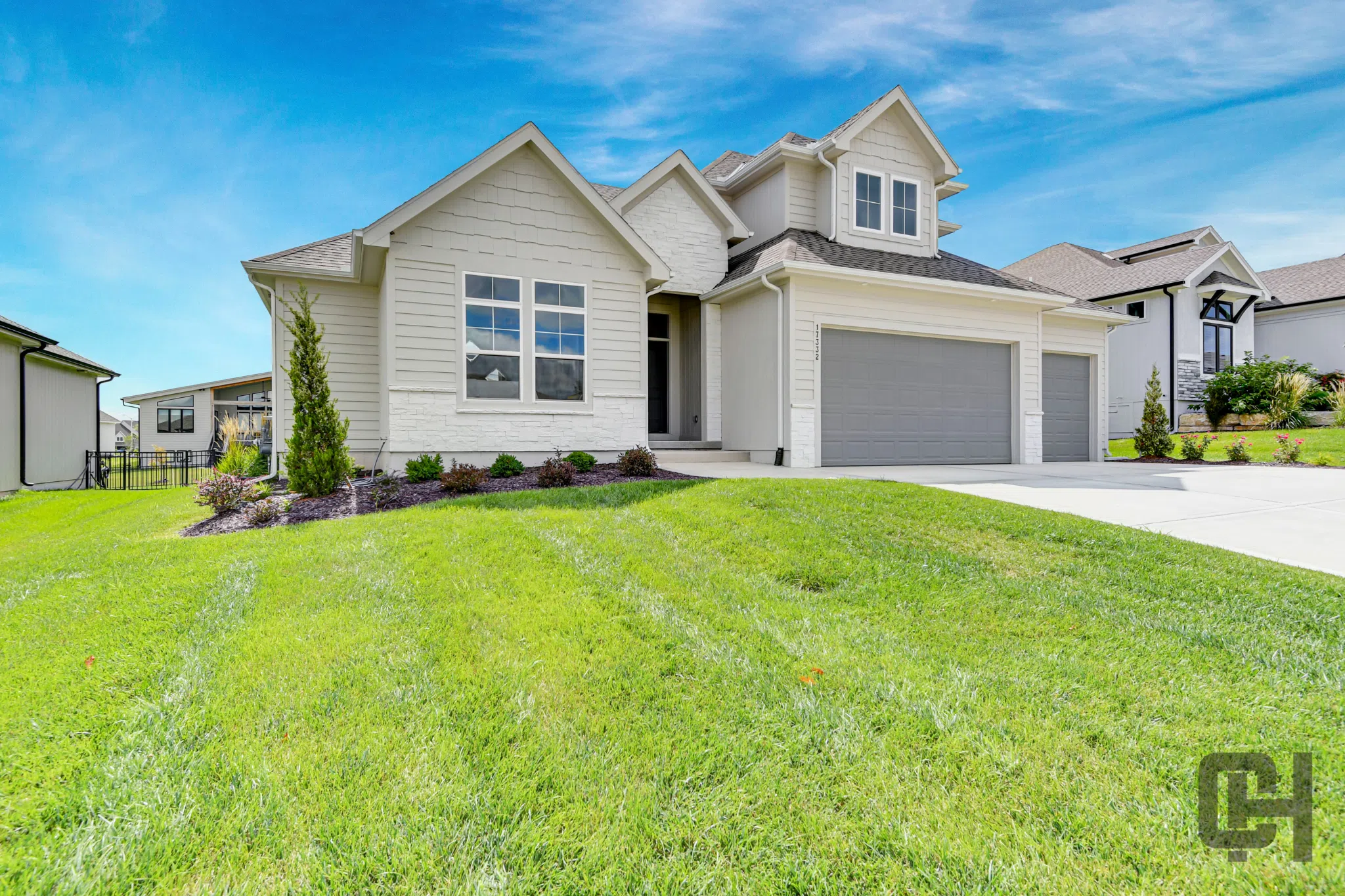 Siena 1.5 Exterior With White Siding And Stone