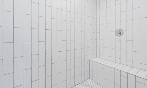 Walk-in Shower With Antimicrobial Grout And White Tile Walls In A Comerio Homes Custom Home