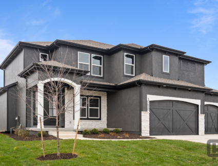 Comerio Homes Justina Elevation A Shown From An Angled Front Exterior View.