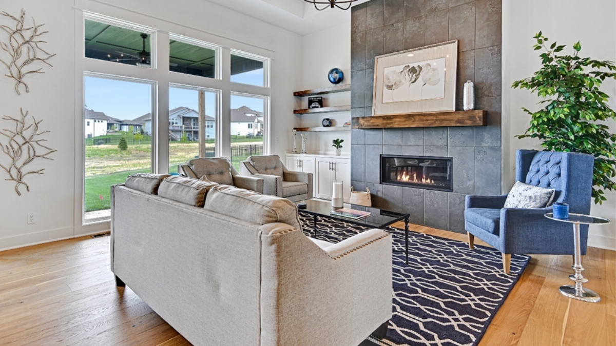 Finished living room interior in a new construction home by Comerio Homes