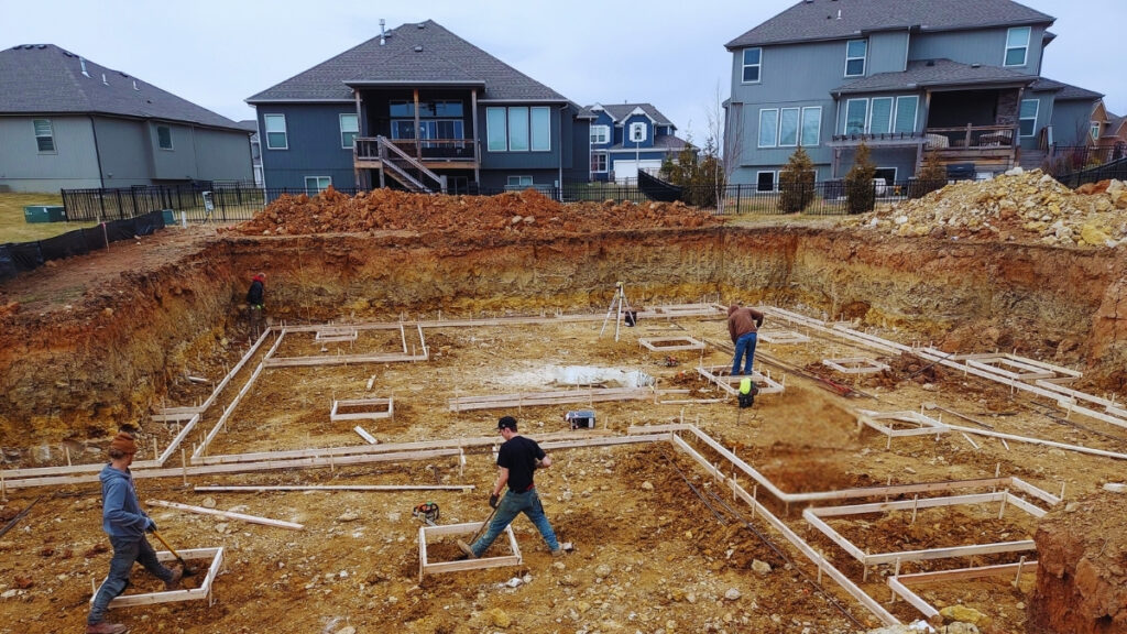 Foundation layout and underground infrastructure work completed before home construction