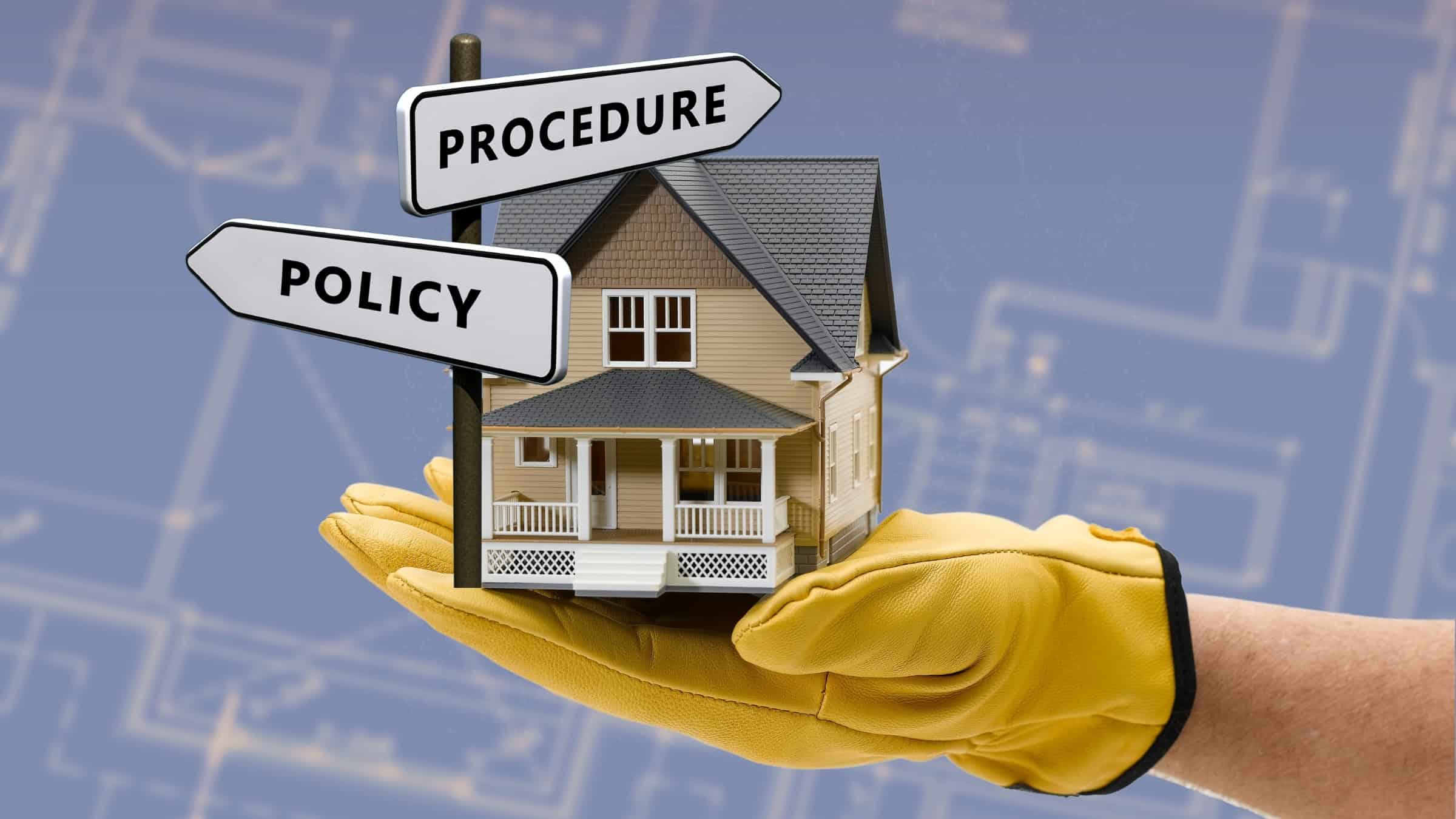 House Model Held In Hand With Policy And Procedure Signs Representing Home Building Process And Guidelines By Comerio Homes