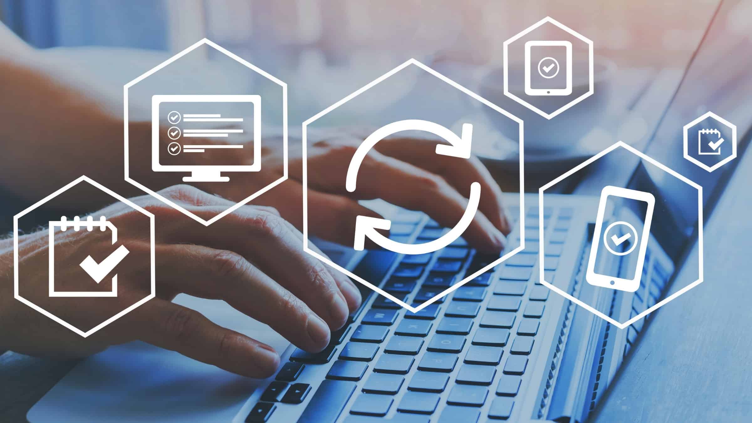 Tablet displaying update icons representing communication and progress tracking in home construction