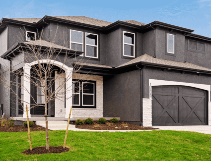 Comerio Homes Justina Elevation A Shown From An Angled Front Exterior View.